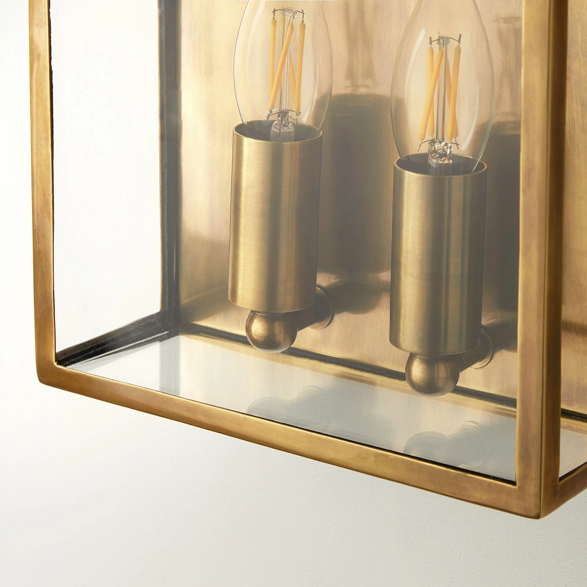 Double Crail IP44 exterior wall light in antique brass