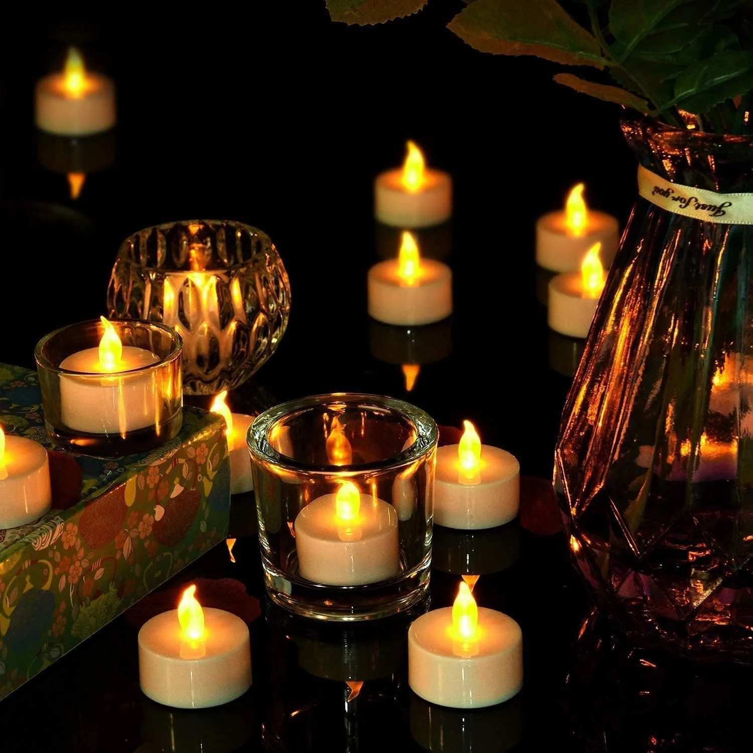 Flameless LED Tea Lights Candles, Battery Operated Flickering Electric Fake Candles Bulk, 100Pack Powered Votive Tealights Long Lasting 200H  Bright Warm Yellow Lamp for Seasonal & Festive Decoration