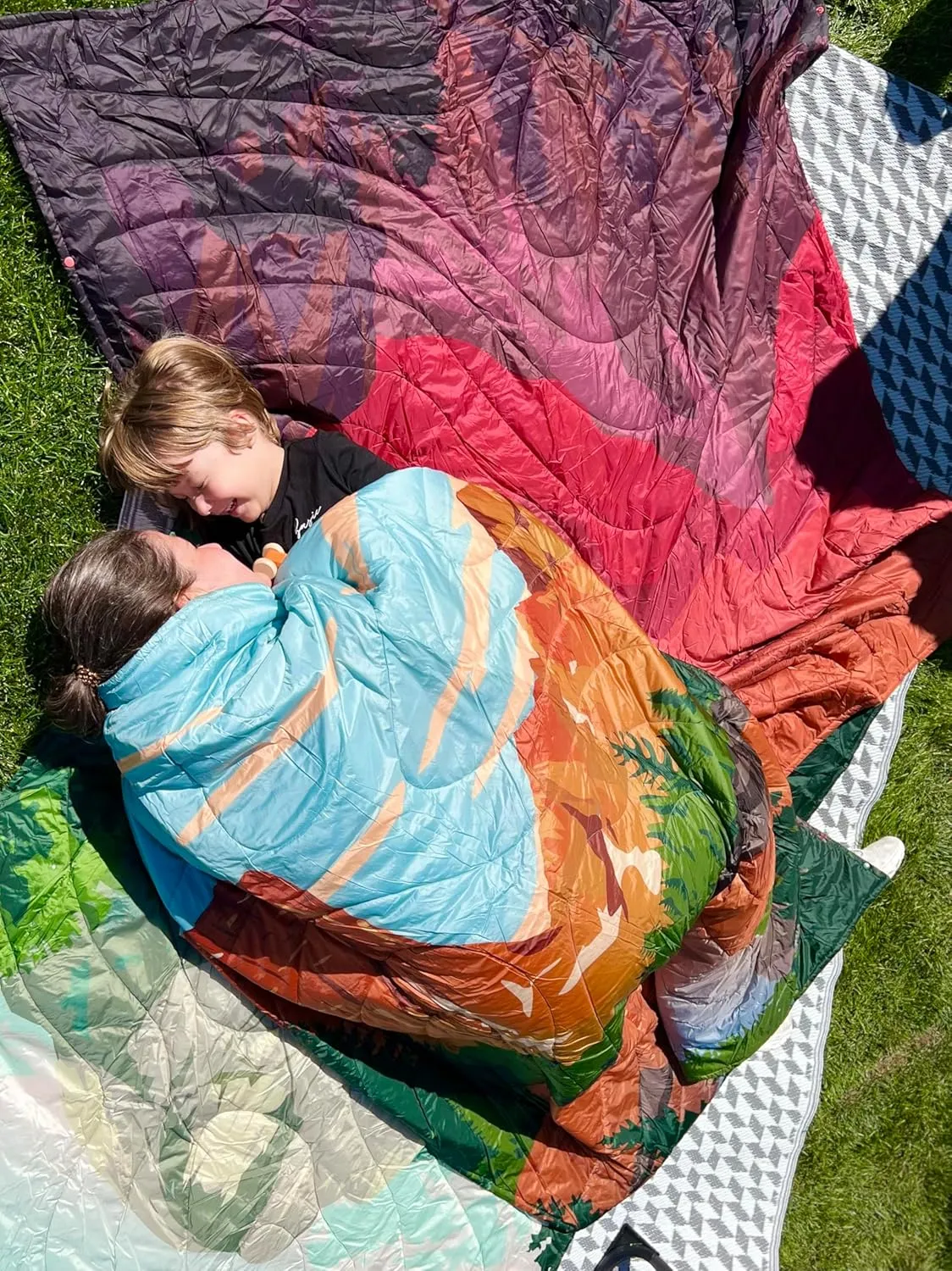 KingCamp Ultralight Camping Blanket, Packable Down Alternative Puffy Printed Wearable Blanket with Snap Buttons & Corner Loops, Weatherproof Quilt for Outdoor Travel Stadium (79" L x 57" W, Rosered)