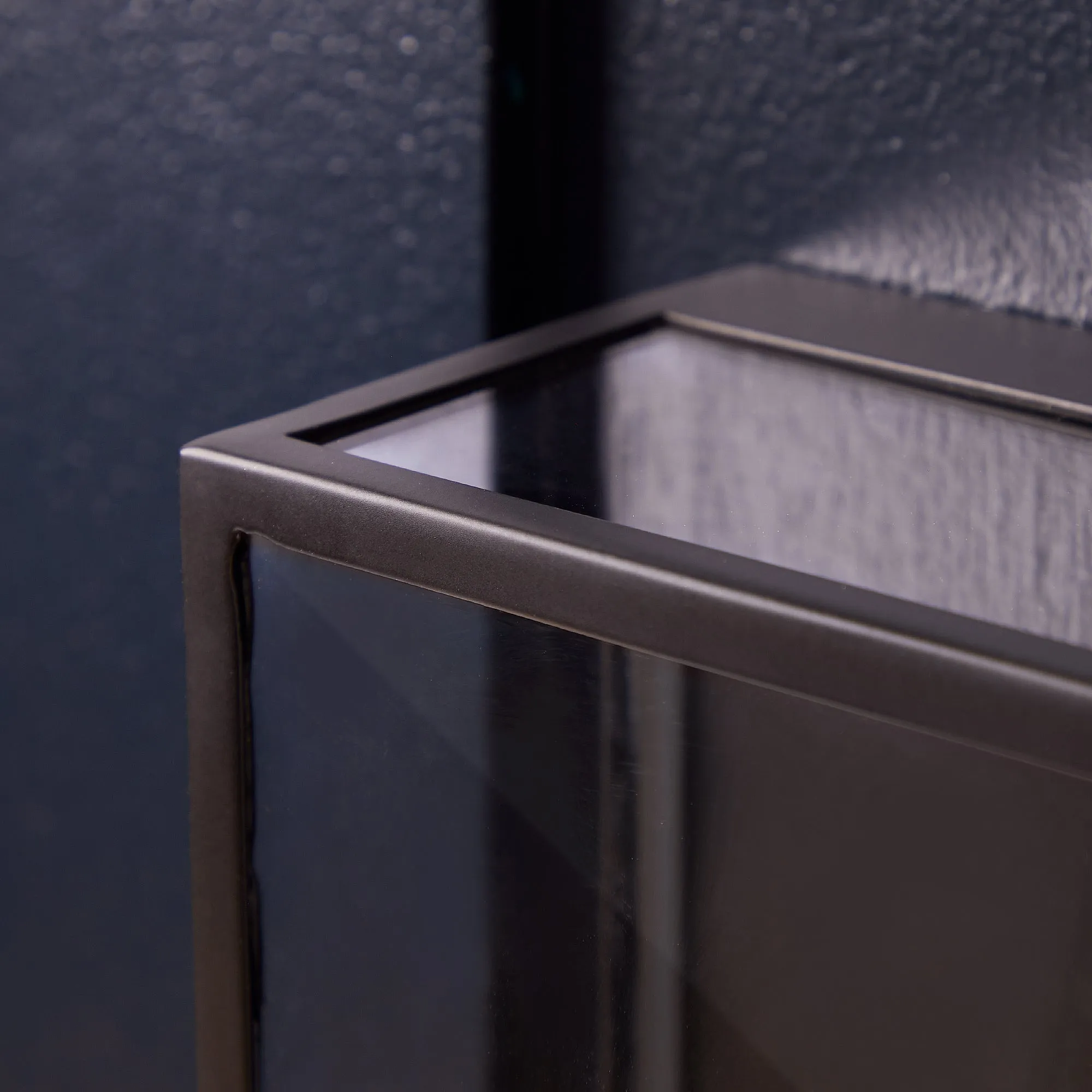 Orford IP44 exterior wall light in blackened brass