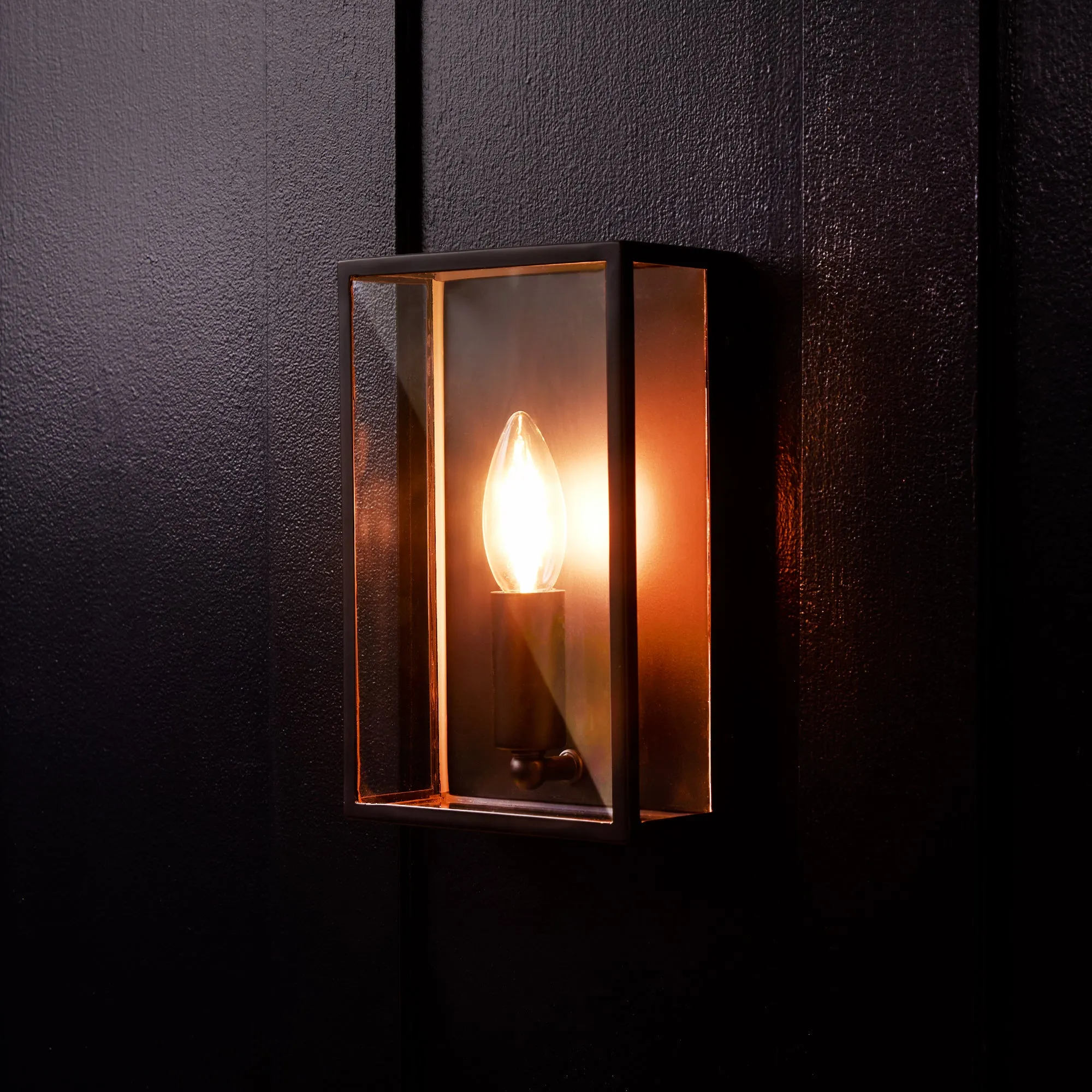 Orford IP44 exterior wall light in blackened brass